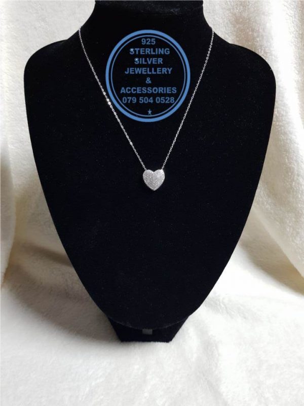 925 sterling Silver chain necklace with floating cubic zirconia heart pendant   - Showstopper  - Stunning!! Price per 1 necklace with floating heart pendant detail Price includes chain and floating heart pendant per photo 45 cm chain All prices excludes national nominal door-to-door delivery fee