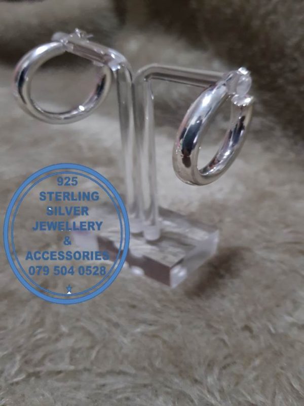 925 sterling Silver Earrings - Stunning Large Tube Hoops with studs Price per 1 pair of earrings 28mm hoop diameter All prices excludes national nominal door-to-door delivery fee Although some earrings might be similar size price is determined on weight as well as manufacturer although all our products are manufactured from the best quality 925 Sterling Silver.
