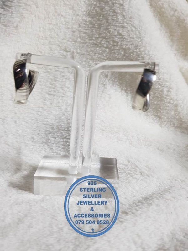 925 sterling Silver Earrings - Statement Twisted Hoop Price per 1 pair of earrings 5mm broad x 27mm top to bottom All prices excludes national nominal door-to-door delivery fee Although some earrings might be similar size price is determined on weight as well as manufacturer although all our products are manufactured from the best quality 925 Sterling Silver.