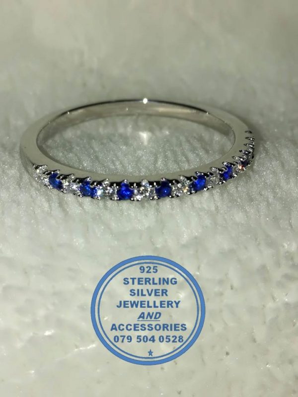 "925 Sterling Silver and blue and clear cubics on top Wedding Band or Stack Ring."