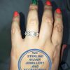 925 Sterling Silver Ring with 3 bands on top as 1 ring with cubic detail. Stunner