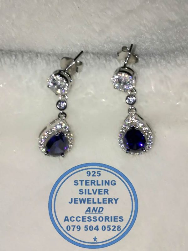 "925 Sterling Silver Dangle Earring with Blue Teardrop Dangle Cubic surrounded with clear cubics on a clear round cubic stud"