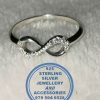 "925 Sterling Silver Infinity ring with cubic detail half infinity part"