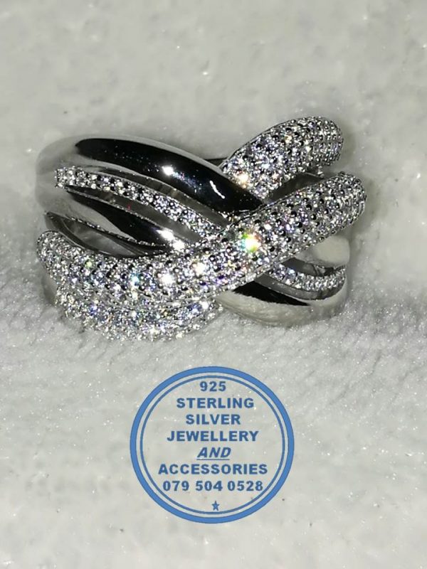 925 Sterling Silver Ring with cross over cubic detail. 5 bands crossing over as 1 Ring. A Statement Bold Showstopper Ring.