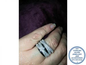 "925 Sterling Silver Statement Ring with 4 bands cross over cubics and 2 silver"