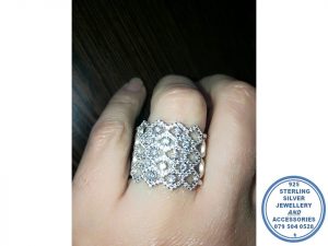 925 Sterling Silver 6 Zig Zag Cubic Bands forming Diamond Shape with middle Round Cubic Statement Ring
