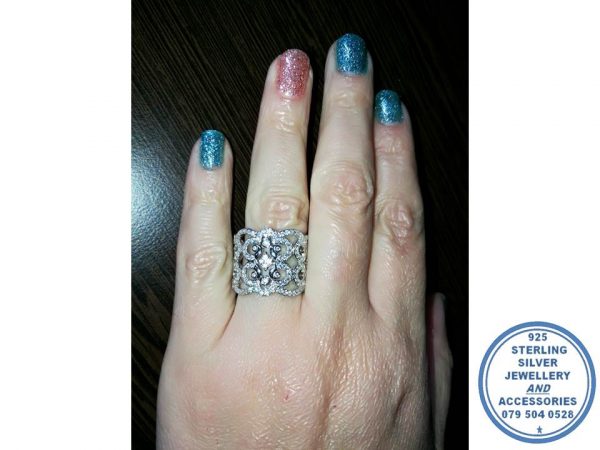 925 Sterling Silver Ring with cubics set in multiple roundings. Showstopper statement Ring.