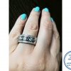 925 Sterling Silver Wedding Band Ring with round cubic middle and plain lines crossing middle cubics with 1 clear side cubic band on either side all as 1 ring