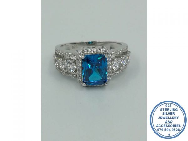 925 Sterling Silver Aqua Blue Rectangular Halo Cubic Ring with clear cubic side detail