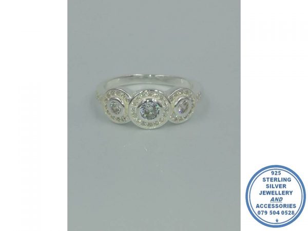 925 Sterling Silver Designers Wedding Ring 3 Round Halo. 1 Large Clear Halo Center with 1 smaller round side halo on either side of this stunning ring