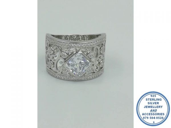 925 Sterling Silver Designer's Ring with a Diamond Shape Clear Square Center and Twirls in sides around center Ring